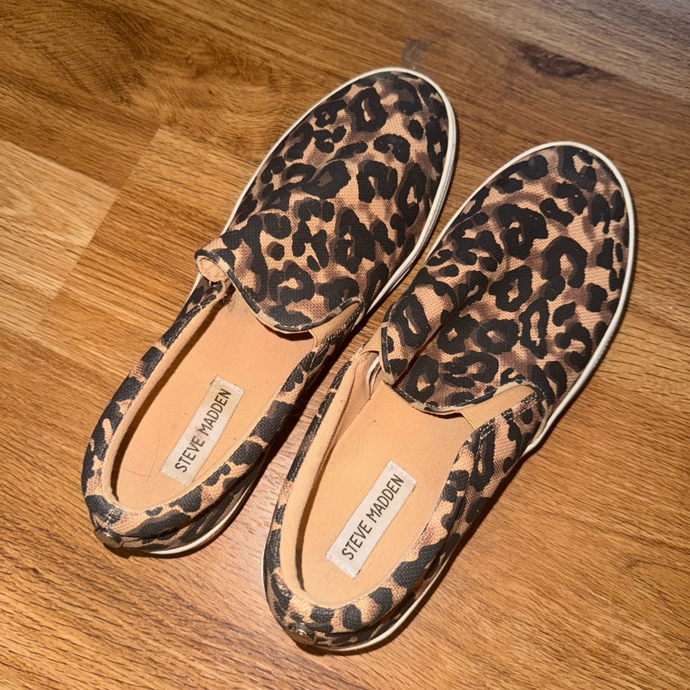 Lightly used Steve Madden cheetah print slips on shoes